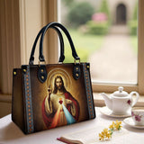 Catholight  A Testament of Grace and Compassion Leather Bag
